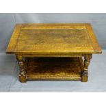 ANTIQUE OAK STYLE COFFEE TABLE with cleated end rectangular top on turned and block supports with