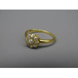 EIGHTEEN CARAT GOLD FLORAL DIAMOND CLUSTER RING, 2.9grms gross, visual estimate of diamonds, 0.5