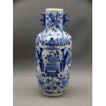 BLUE & WHITE ORIENTAL FIGURAL VASE with floral background, 31cms H, Kangxi marks to the base, 19th