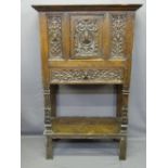 CONTINENTAL CARVED OAK & PINE HUTCH CUPBOARD, linenfold detail to the sides with figural and head