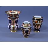 THREE ROYAL CROWN DERBY 1128 PATTERN VASES, 8.5cm, 9cm and 11.5cm heights