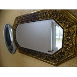 OBLONG BRASS FRAMED BEVELLED WALL MIRROR and a circular frameless art glass mirror