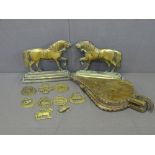 OBLONG BASED BRASS STRIDING HORSE DOORSTOPS, a pair, a small quantity of loose horse brasses and a