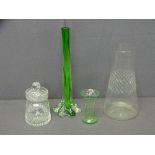 FOUR PIECES OF GLASSWARE, a vase, lidded pot, small green vase and a green twist effect rose vase
