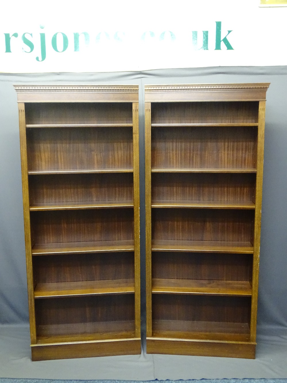 EXCELLENT PAIR OF REPRODUCTION MAHOGANY BOOKCASES with reeded front decoration and fully
