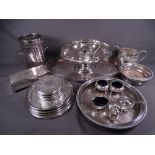 ELECTROPLATE - a parcel including an oval galleried tray, a twin-handled bottle holder, coasters,