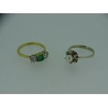 18CT GOLD DIAMOND & EMERALD DRESS RING & ONE OTHER, 0.33ct diamonds flanking a central green