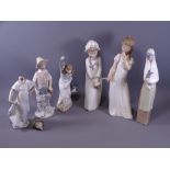 NAO GROUP OF GIRL FIGURINES along with a Lladro boy with fishing basket (some damages)