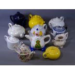 VINTAGE & LATER TEAPOT COLLECTION including an early blue and white example having later additions