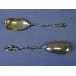 SILVER GILT SERVING SPOONS, a pair, London 1897, in the 17th Century Dutch style, 19cms long, makers