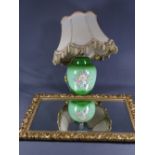 GILT FRAMED BEVELLED WALL MIRROR and a table lamp having a green pottery floral Crown Devon base