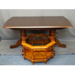 TWIN PEDESTAL MAHOGANY EFFECT DINING TABLE and a glass topped coffee table, 75.5cms H, 152cms L,