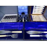 MAHOGANY CASED SET OF BONE HANDLED FISH KNIVES & FORKS, a further set of fish knives and forks,