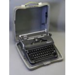 OLYMPIA DELUXE CASED VINTAGE TYPEWRITER made in Western Germany