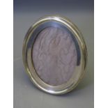SILVER EASEL PICTURE FRAME, oval, Birmingham 1912, 16 x 11cms picture size