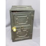 VINTAGE CAST IRON SAFE with key, the door opening to reveal nine interior mahogany drawers with bone