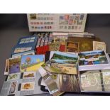 MIXED PARCEL OF EPHEMERA ITEMS including British and World stamps in three part filled albums with