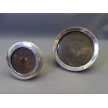 TWO CIRCULAR SILVER EASEL PICTURE FRAMES, Birmingham 1919, 12cms diameter and Chester 1916, 7cms