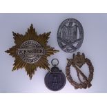 WORLD WAR II GERMAN MEDALS & BADGES, four items including an Infantry Assault badge lacking pin, a