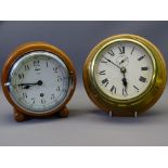 TWO VINTAGE CLOCKS including a circular oak Tempora brand with chromed bezel and a brass cased