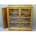 MAHOGANY ASTRAGAL GLAZED BOOKCASE with back rail top over thirteen pane twin-glazed doors and