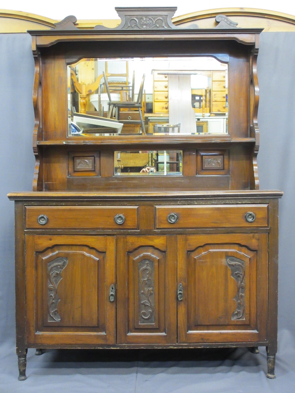 CIRCA 1900 MAHOGANY MIRROR BACK SIDEBOARD with central shelf and carved detail over a two drawer,