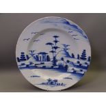 LATE 18/EARLY 19TH CENTURY ENGLISH DELFT CHARGER, 36cms D, decorated Chinese style showing fences