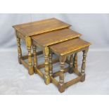 GOOD REPRODUCTION OAK NEST OF THREE TABLES, 47cms H, 55cms W, 35cms D the largest