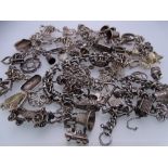 FIFTY PLUS SILVER & WHITE METAL CHARMS, bracelets and part bracelets, 7.26 troy ozs gross