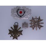 WORLD WAR II GERMAN THIRD REICH WAR MERIT CROSSES, First and Second Class, wreath and cockade