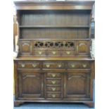 QUALITY REPRODUCTION OAK WELSH DRESSER having a canopy type two shelf rack with hanging hooks over a