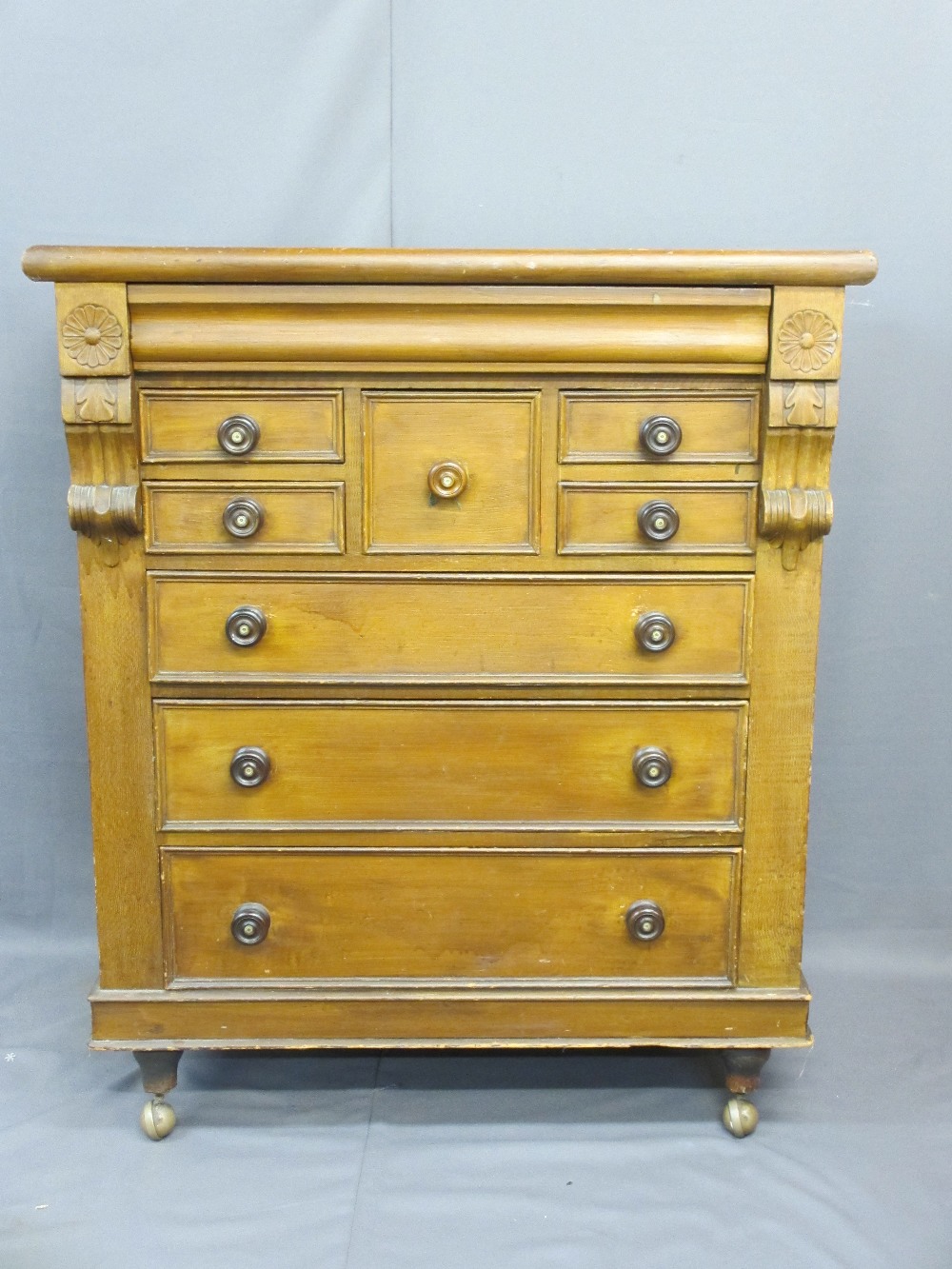 VICTORIAN SCUMBLED PINE CHEST OF MULTIPLE DRAWERS ON CASTORS, 137cms H, 115cms W, 54cms D