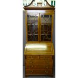 EXCELLENT CROSSBANDED MAHOGANY BUREAU BOOKCASE, circa 1900 with broken swan neck pediment and