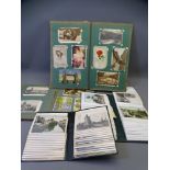 VINTAGE POSTCARDS - a quantity of 350 plus in two vintage and two modern albums, some busy street