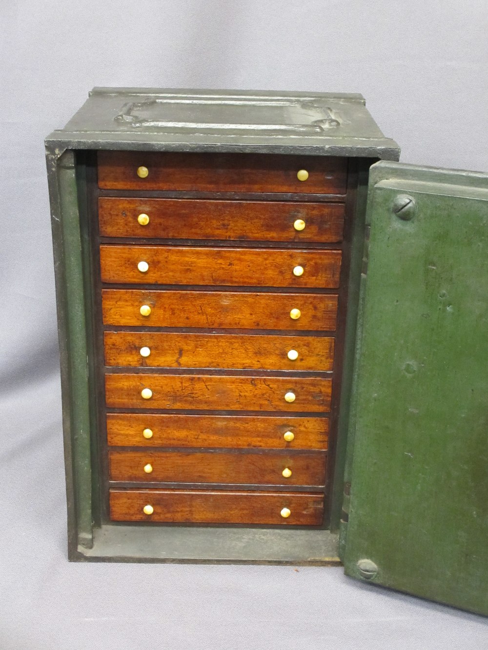 VINTAGE CAST IRON SAFE with key, the door opening to reveal nine interior mahogany drawers with bone - Image 2 of 3