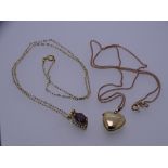 A 9CT GOLD HEART SHAPE LOCKET WITH FINE LINK CHAIN, 3.8grms and a 9ct gold garnet pendant and chain,