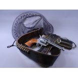SPANISH REPLICA REVOLVER with leather holster and belt along with a wide brimmed hat