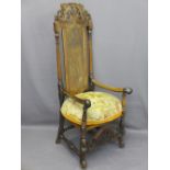 CHARLES II STYLE WALNUT HIGHBACK HALL CHAIR with carved crest rail above a cane back and seat with