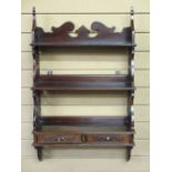 REPRODUCTION MAHOGANY WALL HANGING SHELF with fretwork sides and twin lower front drawers, 86cms