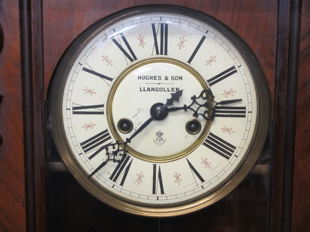 GUSTAV BECKER WALNUT CASED WALL CLOCK the dial set with Roman numerals marked 'Hughes & Son