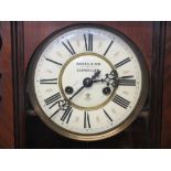 GUSTAV BECKER WALNUT CASED WALL CLOCK the dial set with Roman numerals marked 'Hughes & Son
