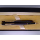 CROSS - Modern Matte Black Cross Classic Century fountain and ballpoint pens with gold trim and