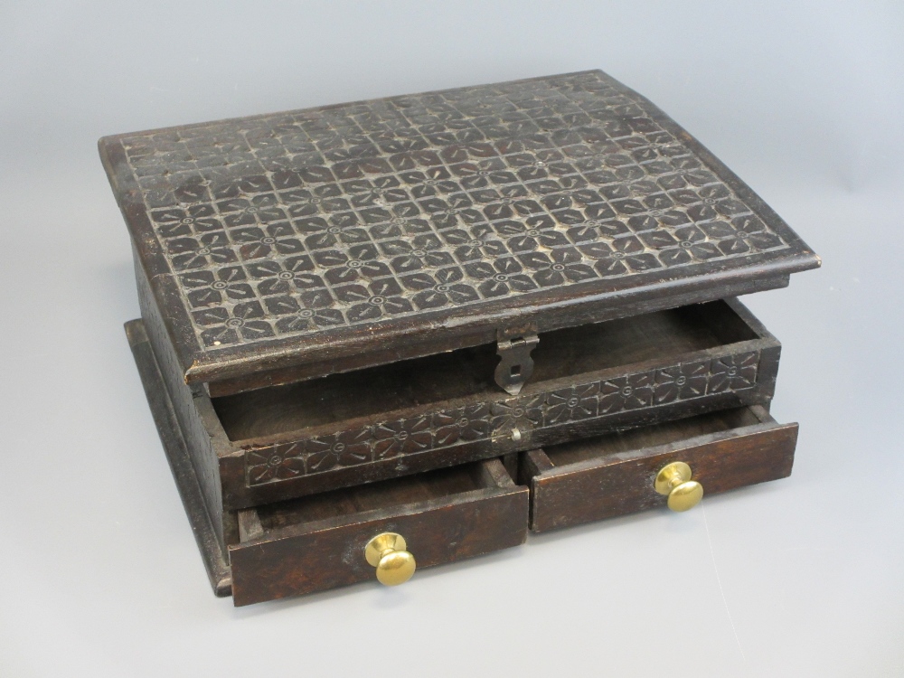 ANTIQUE STYLE CARVED OAK BIBLE BOX with lift-up lid and twin lower drawers, 16.5cms H, 41cms W, 34. - Image 2 of 3
