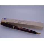 CONWAY STEWART - Vintage (1950s) Red Marble Conway Stewart 550 "Dinkie" fountain pen, with gold trim