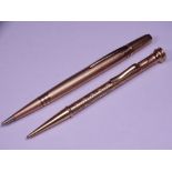 TWO 9CT GOLD STAMPED VINTAGE RETRACTABLE PENCILS, one marked 'Life Long' with banding and engine