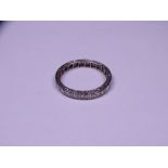 DIAMOND SET FULL ETERNITY RING, unmarked and untested white metal believed gold, set with 23 x 0.