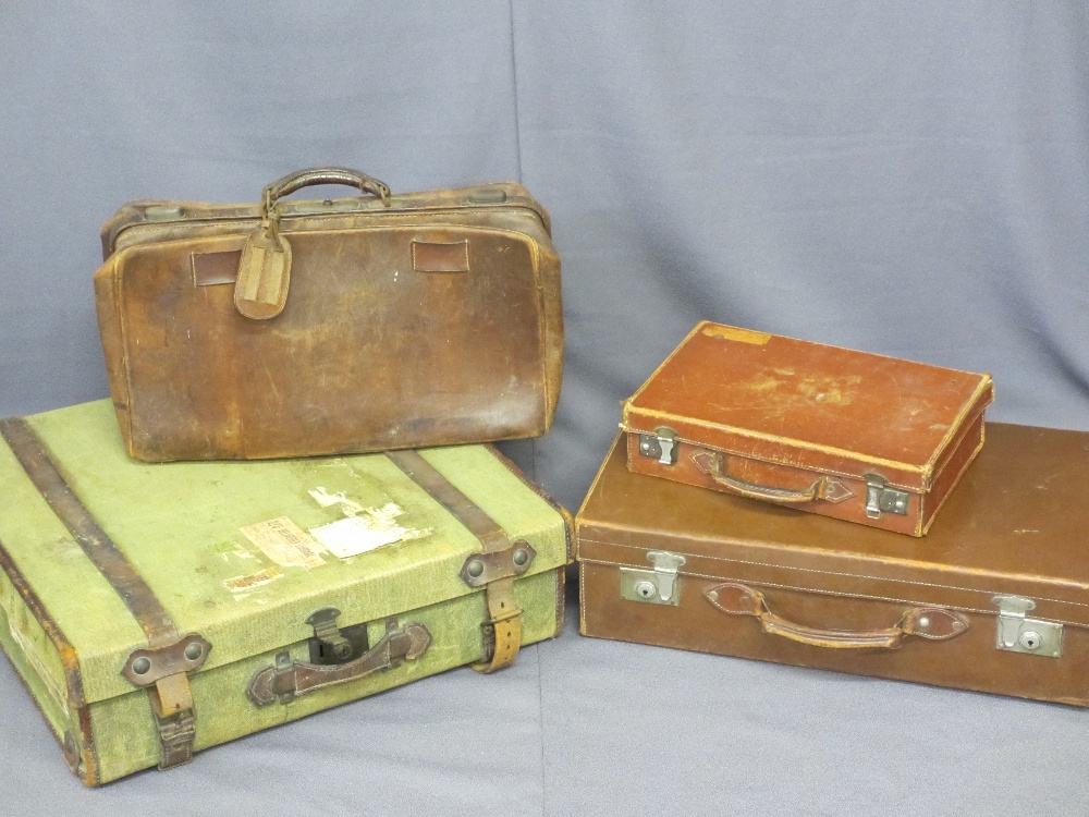 FOUR VINTAGE TRAVEL CASES including a canvas type example with leather straps and luggage labels