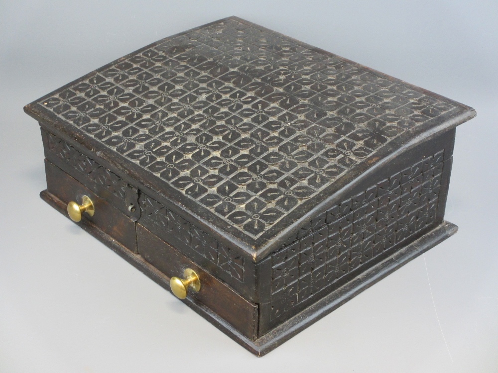 ANTIQUE STYLE CARVED OAK BIBLE BOX with lift-up lid and twin lower drawers, 16.5cms H, 41cms W, 34.