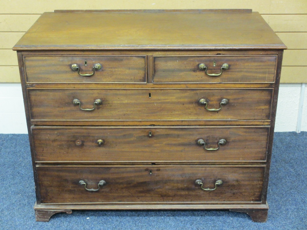 GEORGIAN MAHOGANY CHEST of two short over three long drawers, oak lined with brass swan neck handles