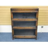 VINTAGE OAK THREE SECTION BOOKCASE, Globe Wernicke style with lift-up glass front doors, 112cms H,
